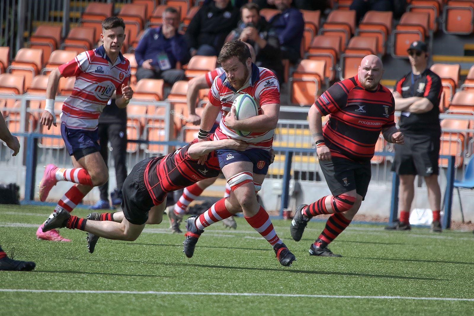 Neil Alexander tries to drive through defence, supported by Rory Millar. Picture: John MacGregor