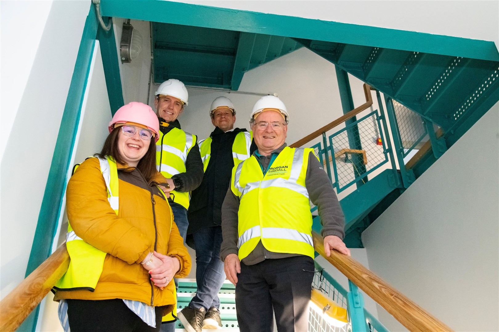 Inside the newly refurbished Poundland in Elgin. From left: Architect at LDN Pinny Muir, retail director Alan Smallman, director of property portfolio Ben Wall and store manager Gerry McAloon.