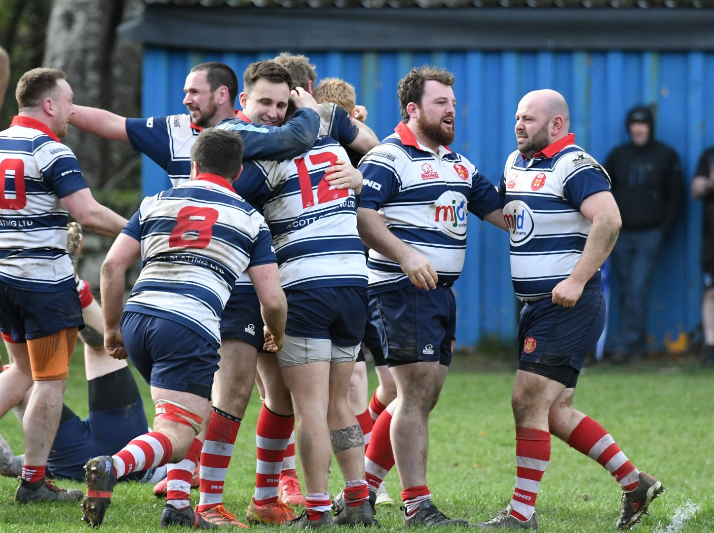 Moray celebrate at the end of their thrilling victory. Picture: James Officer