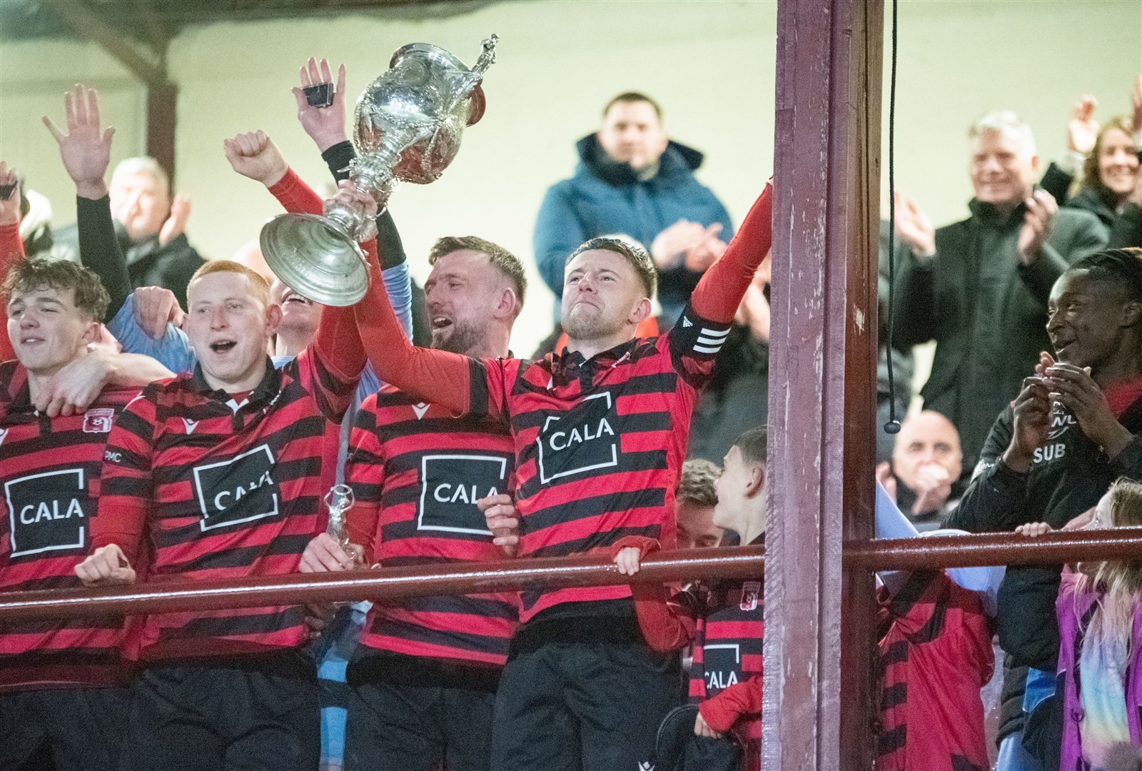 Inverurie Locos lift the cup. Inverurie Loco Works (0) vs Buckie Thistle FC (0) Inverurie win 7-6 on penalties - Aberdeenshire Cup Final - Kynoch Park 23/04/2024.Picture: Daniel Forsyth.