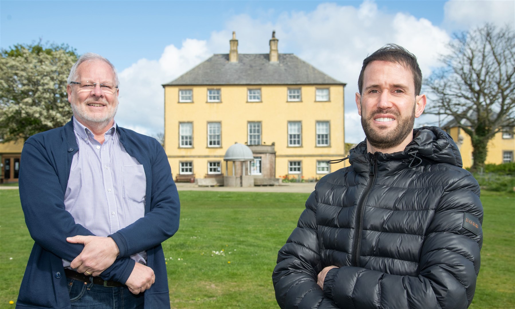 Banff Councillor John Cox (left) is joined by Russell Aitchison (right) organiser of a new music festival in Banff - that will be held in the Castle gorunds. Picture: Daniel Forsyth.