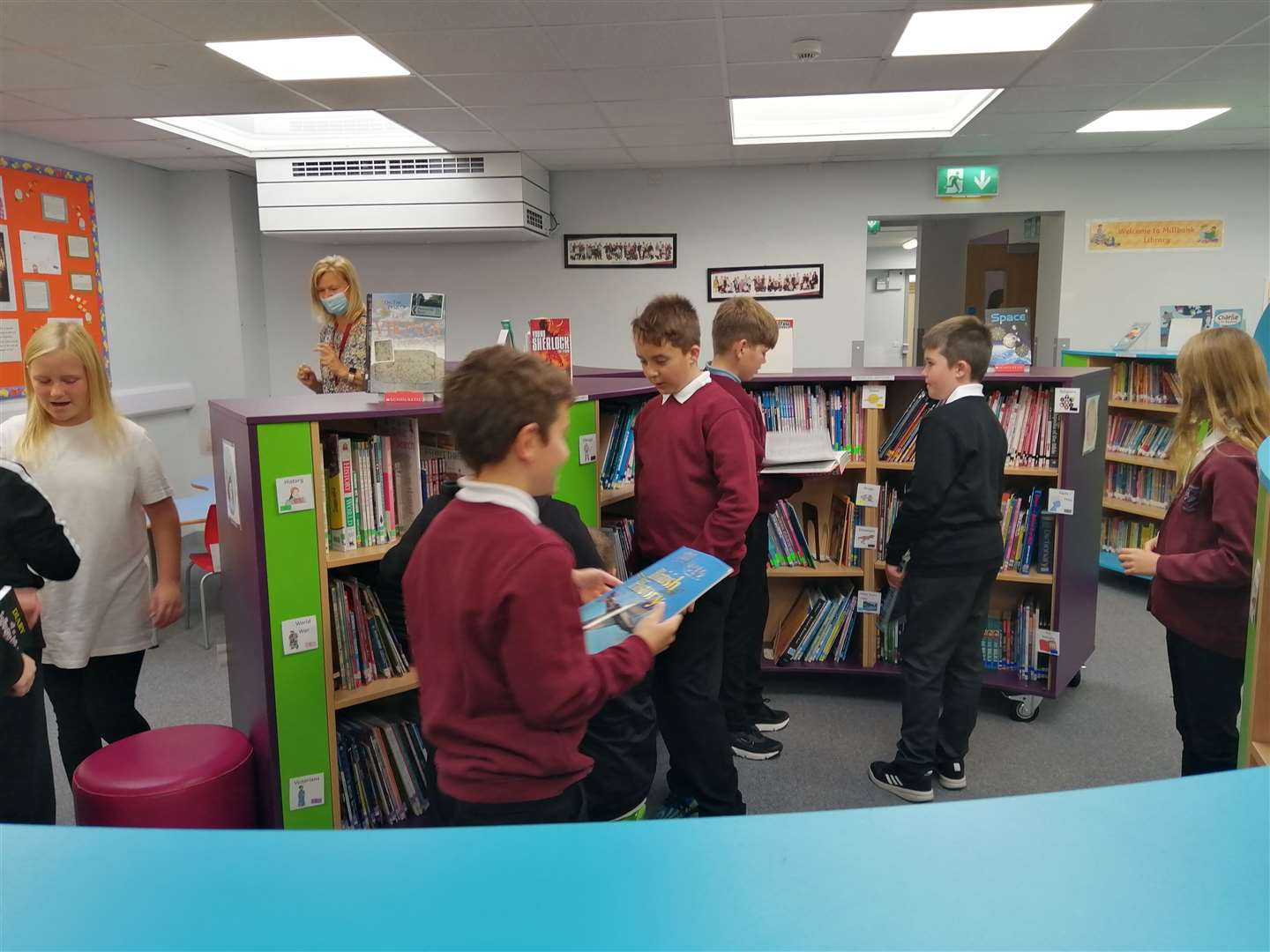 Millbank pupils explore the new look library.