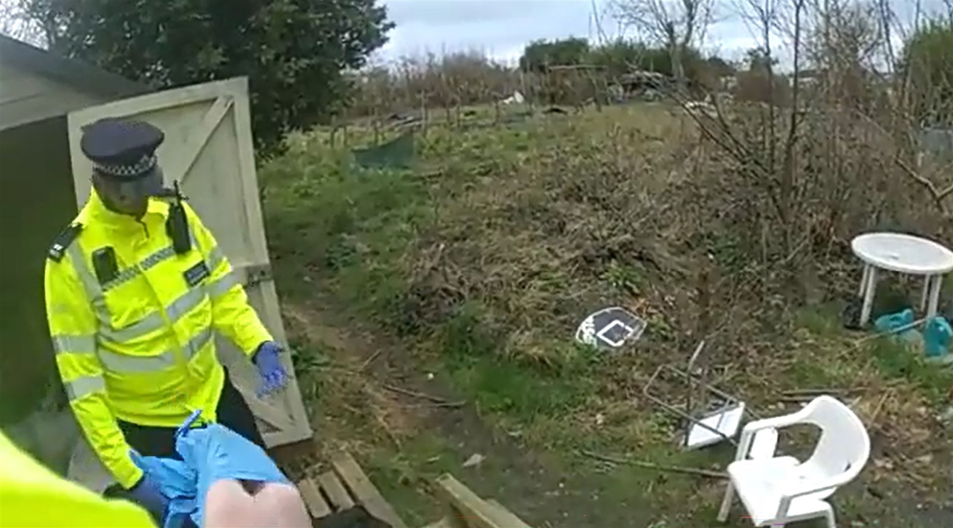 Screen grab taken from body worn camera footage of the moment the body of a missing baby girl was found in a Lidl bag (Met Police/PA)