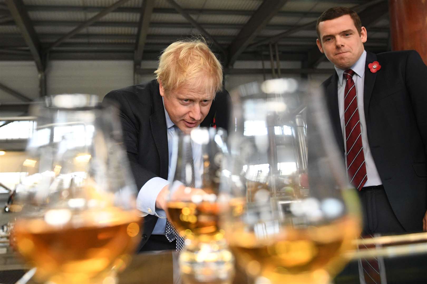 Boris Johnson raising a toast to the Scotch whisky industry with Douglas Ross during a previous visit to Moray. The Moray MP and Scottish Conservative leader was one of 148 party members who declared no confidence in the Prime Minister this week.