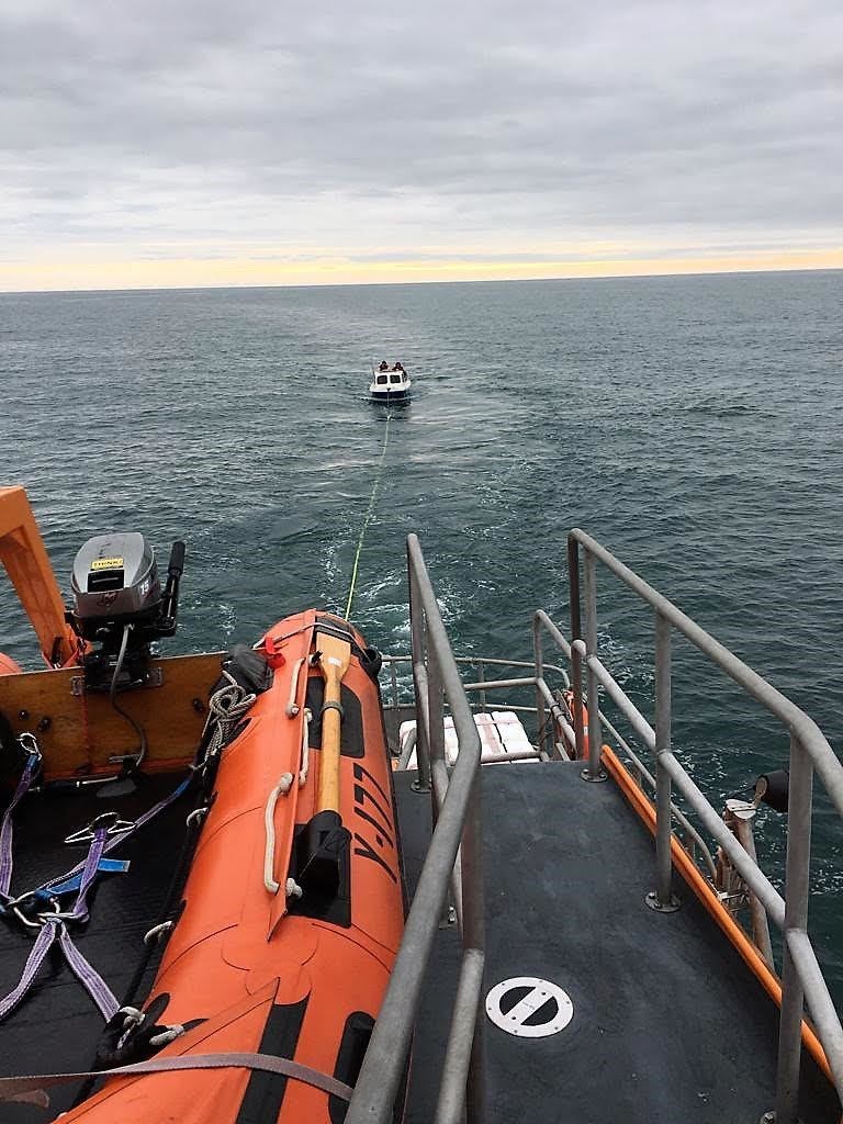 Buckie’s RNLB ‘William Blannin’ tows the 18ft casualty vessel to harbour.