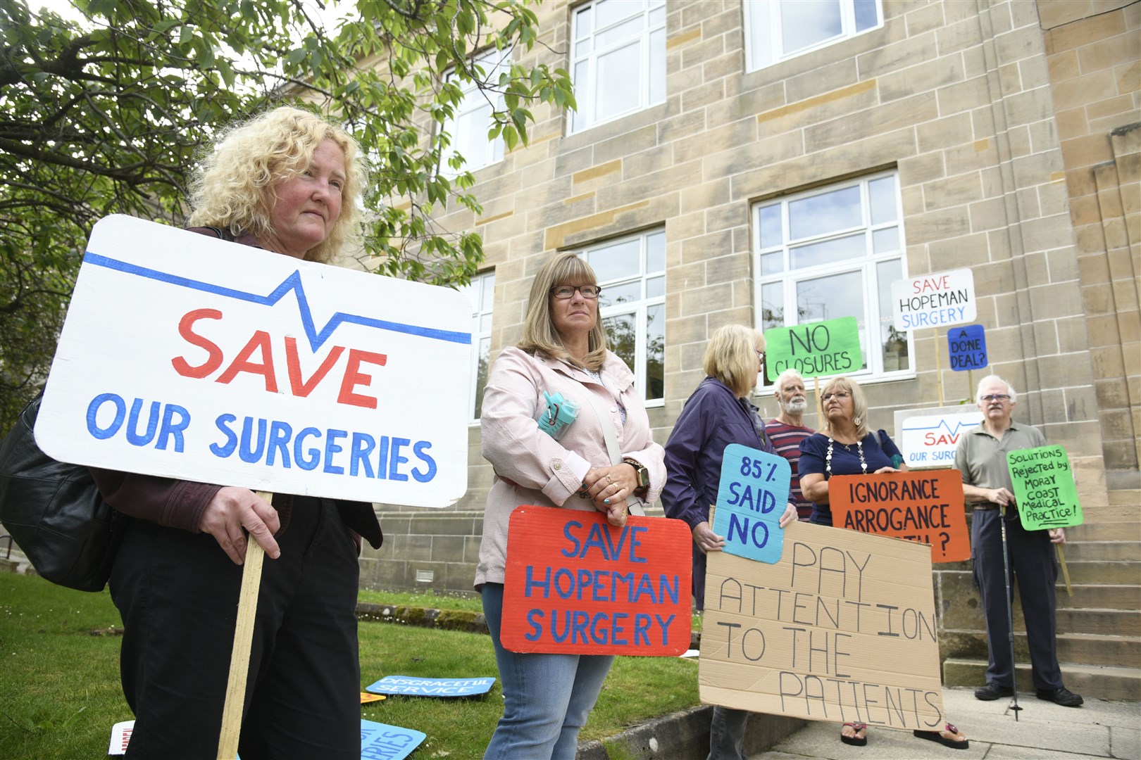 Protestors – including Melinda McGiff (second left) outside Moray Council's headquarters. Picture: Daniel Forsyth