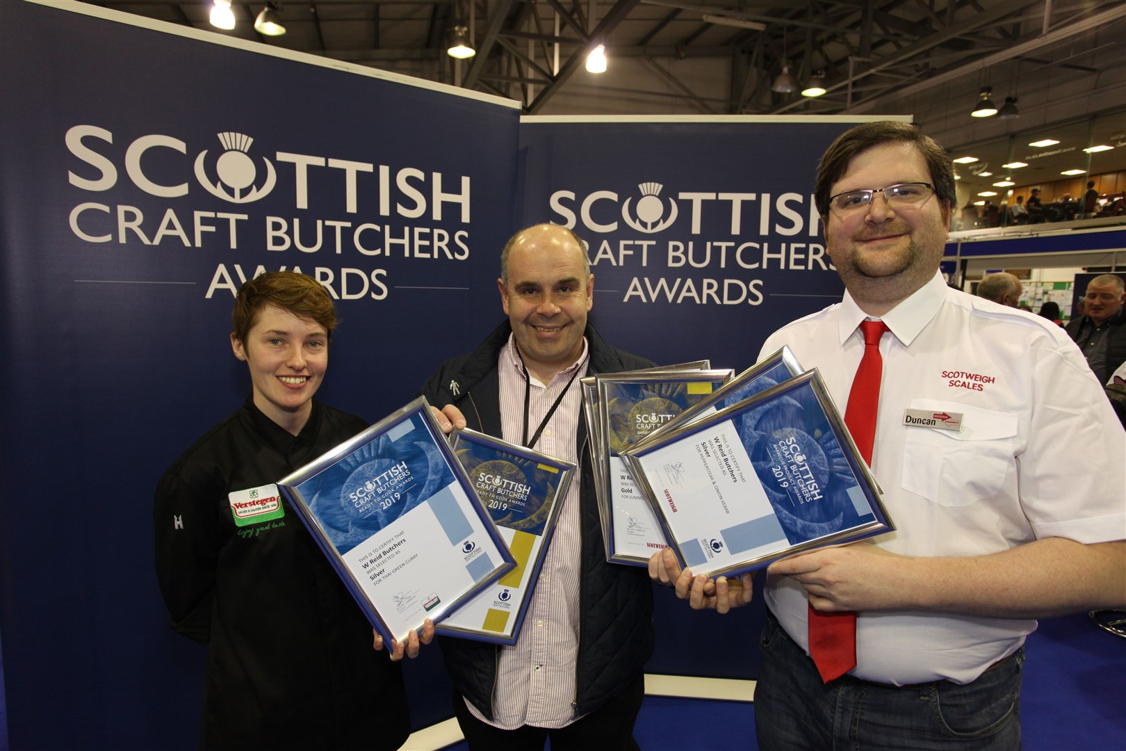 Philip Robertson (centre) from W Reid with contest sponsors Erin Conroy from Verstegen and Duncan McVicar from Scotweigh.