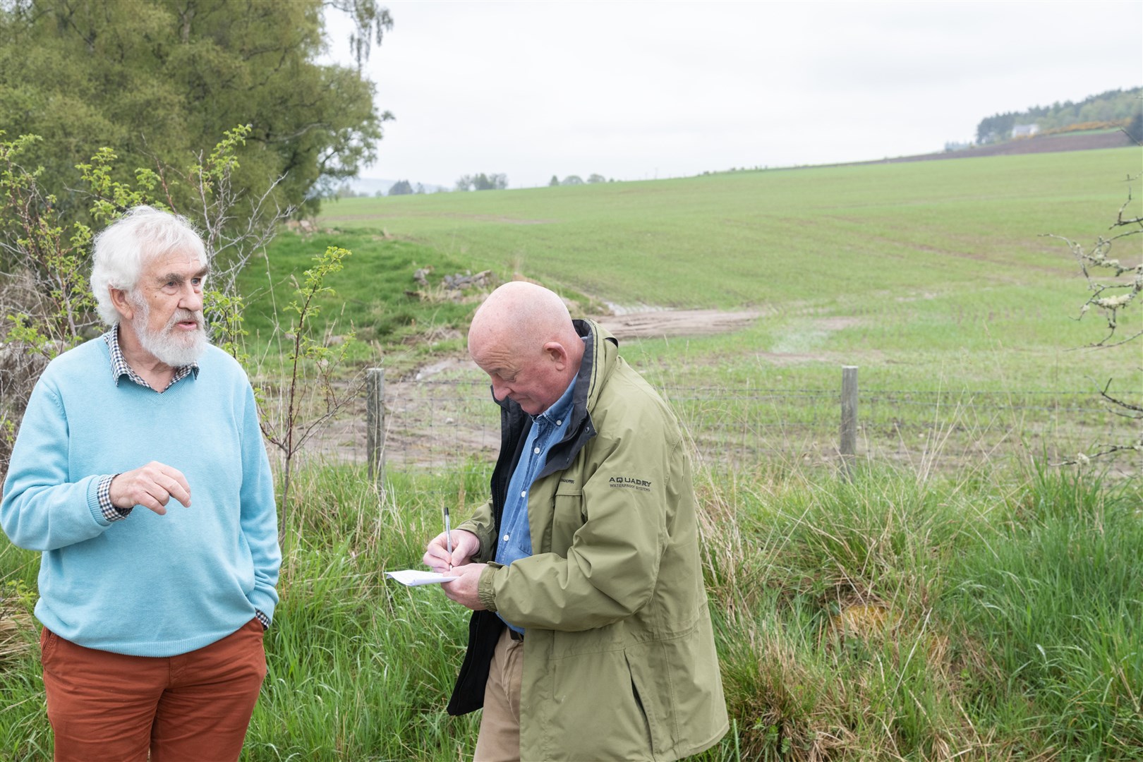 Alan Soutar (left) and Councillor for Speyside Glenlivet, Derek Ross (right) discussing the floods in Aberlour...Picture: Beth Taylor.
