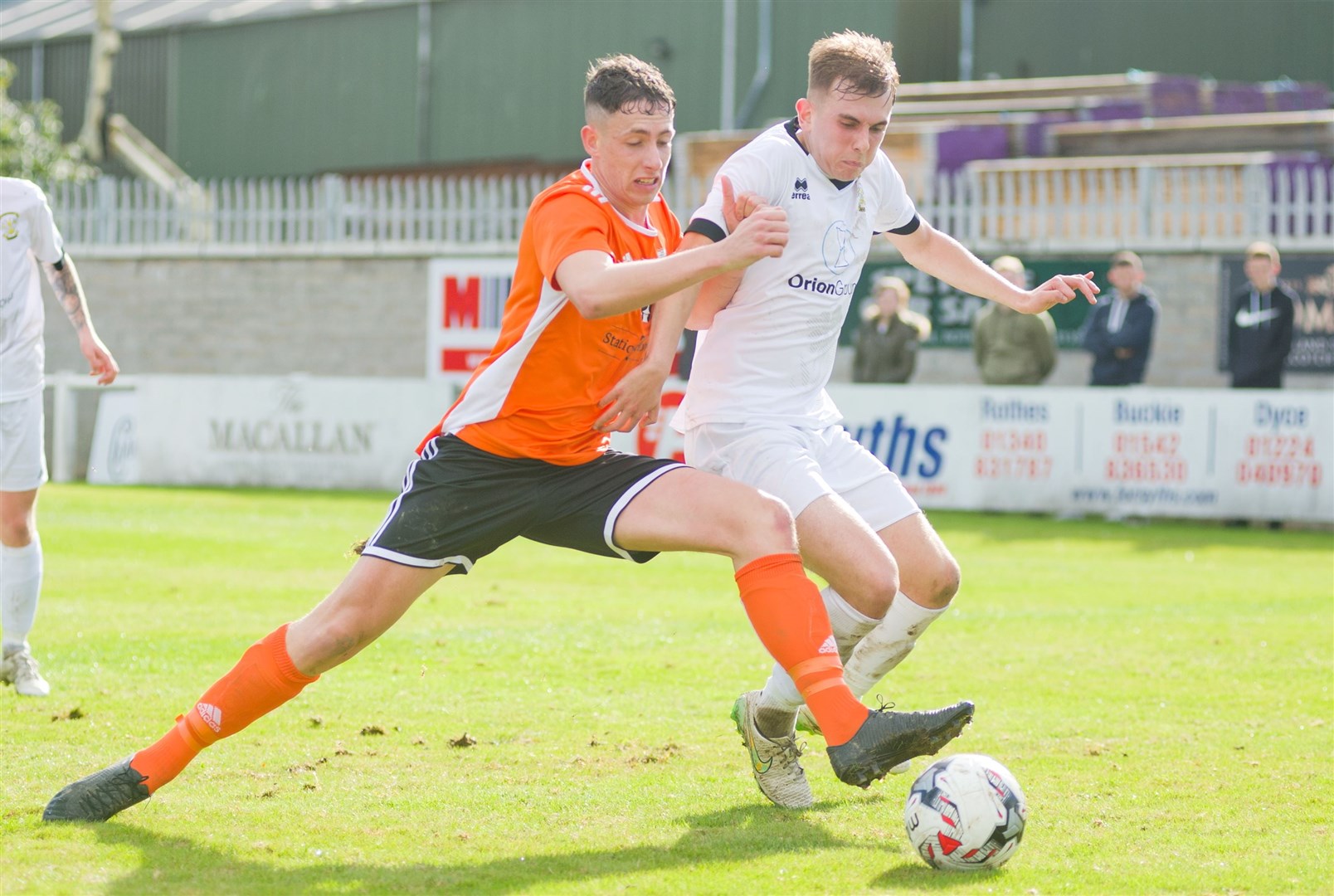 Wearing the colours of former club Clach, Fraser Robertson in action against current team Rothes. Picture: Daniel Forsyth. Image No.042175.