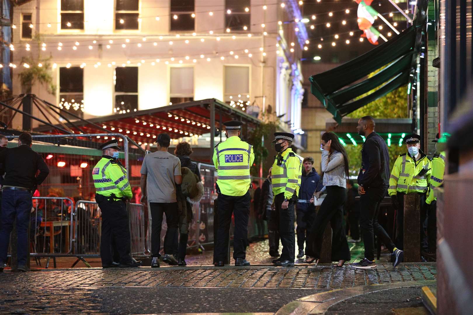 Police on patrol in Liverpool city centre ahead of the 10pm curfew (Peter Byrne/PA)