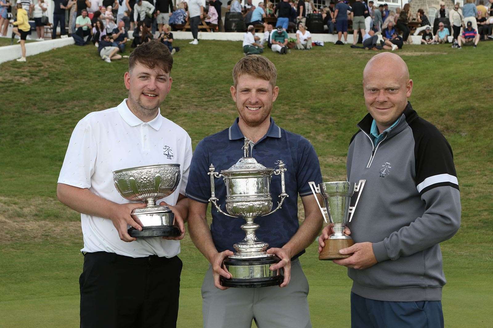 From left: Jack McNeilly, Craig Smith and Shaun Heyes with their trophies. Picture: John MacGregor
