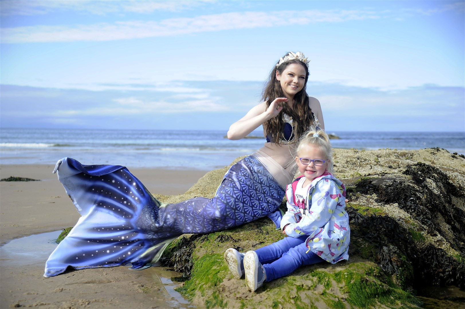 The Moray Firth Mermaid meets a young fan at Hopeman Beach. Picture: Becky Saunderson