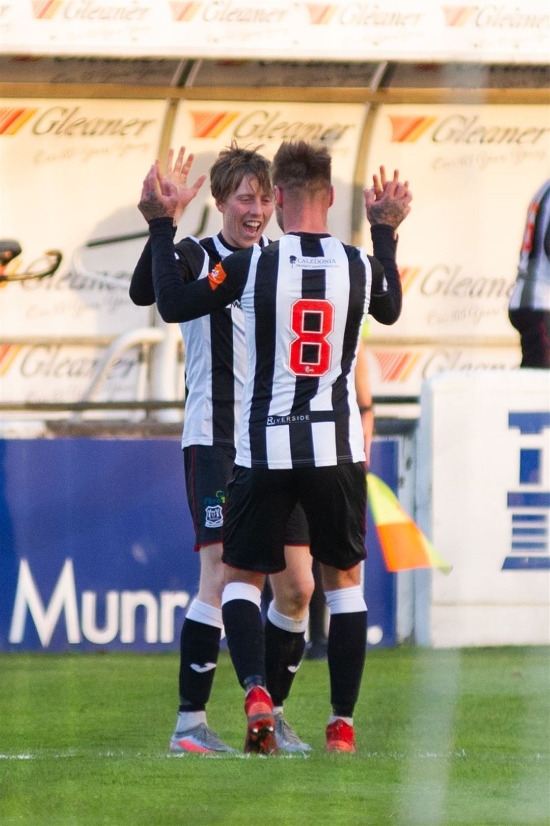 Elgin City's Kane Hester celebrates with Brian Cameron. Picture: Daniel Forsyth