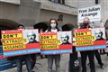 Julian Assange appears at Old Bailey to fight US extradition
