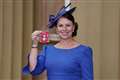 Woman who ran marathons dressed as fruit made an MBE