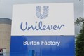 Buoyant Unilever helps save FTSE from global falls