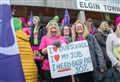 WATCH: Huge crowd of striking teachers at Elgin rally get support from passing car