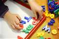 Parents spending £10,000 a year on childcare – report