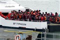 Nearly 700 migrants cross Channel in single day in record high for 2022