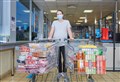 Elgin shopper boosts foodbank in store's 'Supermarket Sweep' 