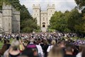 Windsor churches pay tribute to the Queen as large crowds visit town