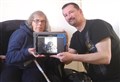 Volunteers help elderly and disabled with new technology