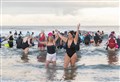 PICTURES: Record numbers turn out for icy new year splash at Cullen