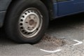 PM pledges to tackle ‘scourge of potholes’ with £8.3bn fund