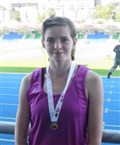 Discus girl excels on international debut