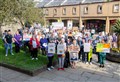 Concerned parents rally against proposed cuts to ASN support staff