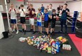 Elgin Amateur Boxing Club donates £300 and food to Moray Food Plus