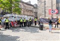 'Well done Elgin': Watch as far-right protesters are escorted from the High Street by police