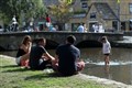 Parts of UK on track to recording heatwave as temperatures soar