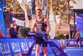 Triathlon champion recalls being sick in his first event and not being able to swim a stroke