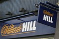 William Hill shares surge after two takeover approaches