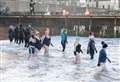 PICTURES: Dozens brave icy waters for Cullen Boxing Day Dook