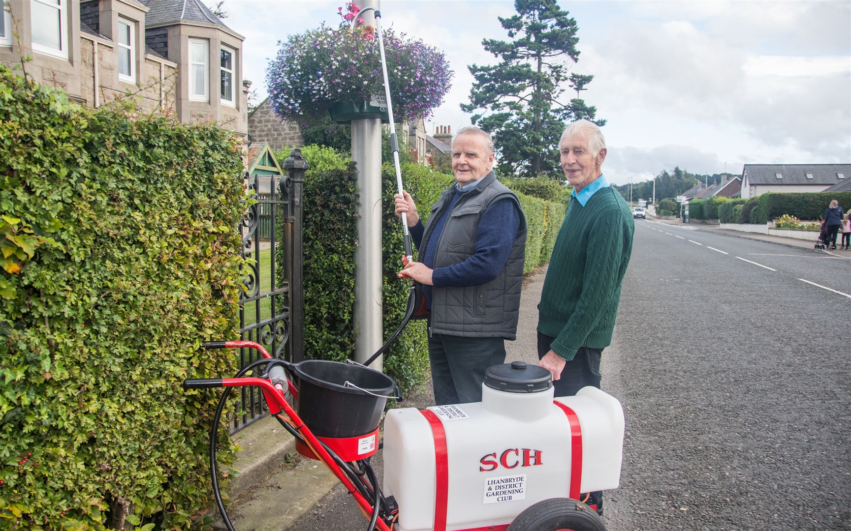 Ian Ogg and Bill Clarihew, of Lhanbryde and District Gardening Club, put the new equipment to the test. Picture: Becky Saunderson.