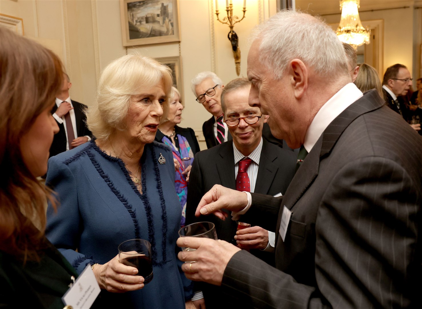 The Queen Consort meets Gyles Brandreth at she launched her The Queen’s Reading Room charity (Chris Jackson/PA)