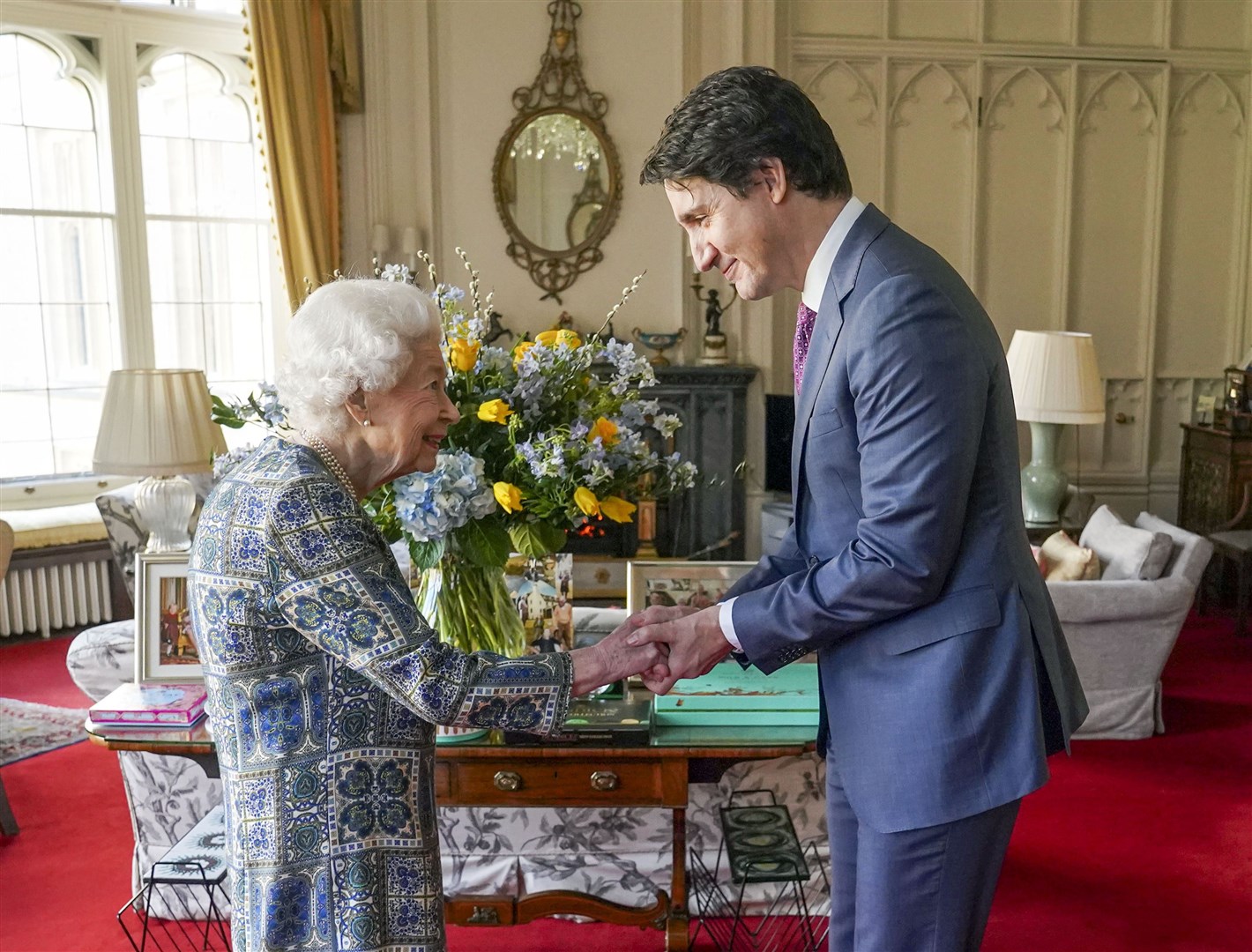 Queen Elizabeth II receives Canadian Prime Minister Justin Trudeau during an audience at Windsor Castle, Berkshire in March (Steve Parsons/PA)