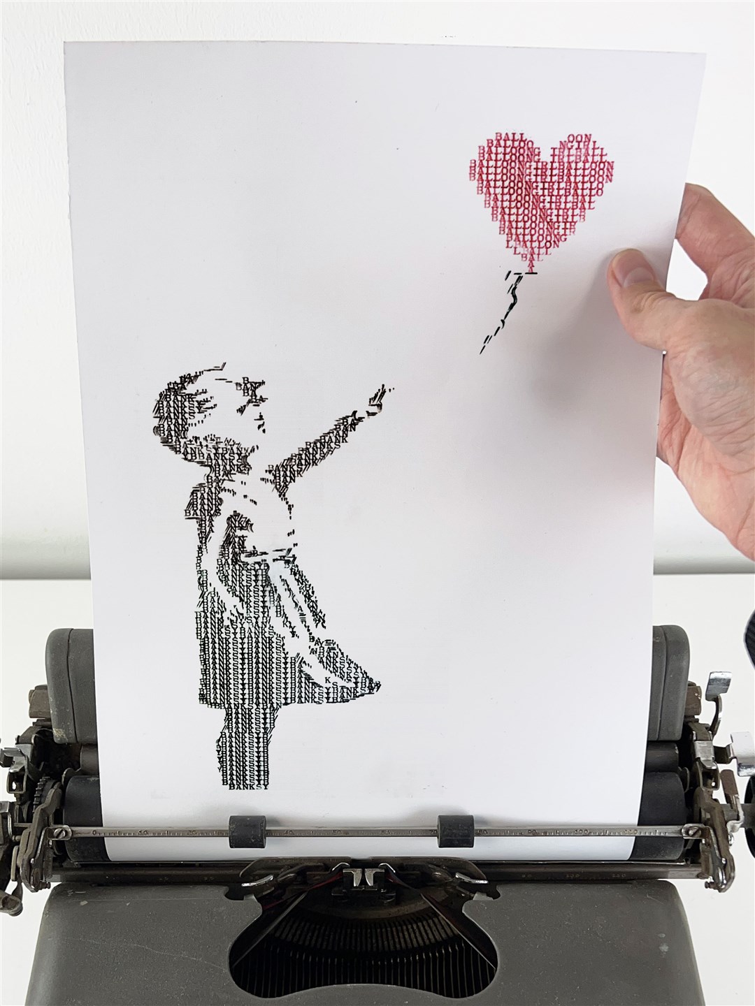 Banksy’s Girl With Balloon mural made using typewriter (James Cook)