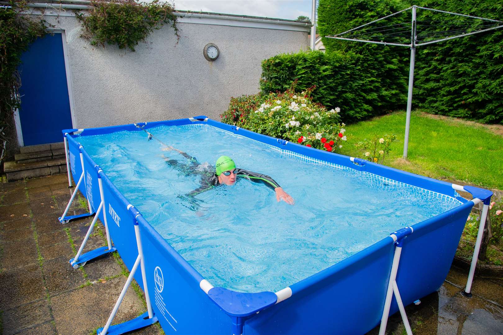 Cameron Main in a makeshift training pool at home. Picture: Daniel Forsyth