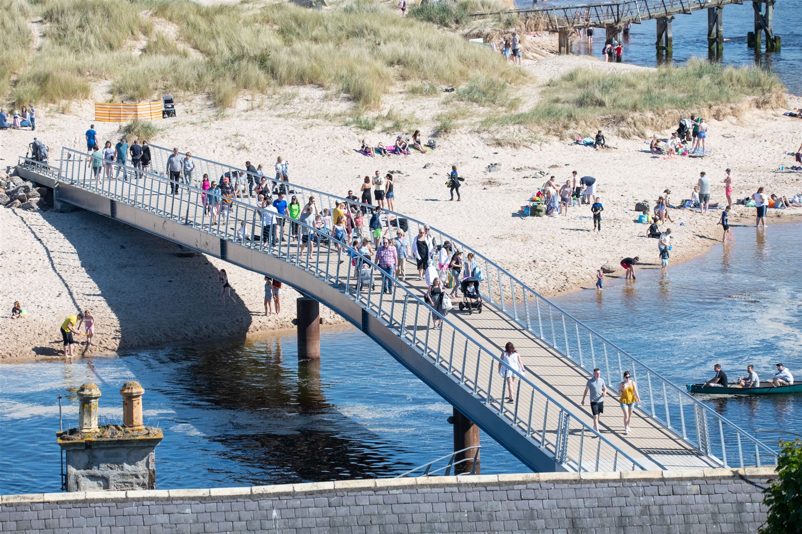 People return to the Lossiemouth East Beach following the opening of the new bridge over the Bank Holiday weekend.Picture: Daniel Forsyth