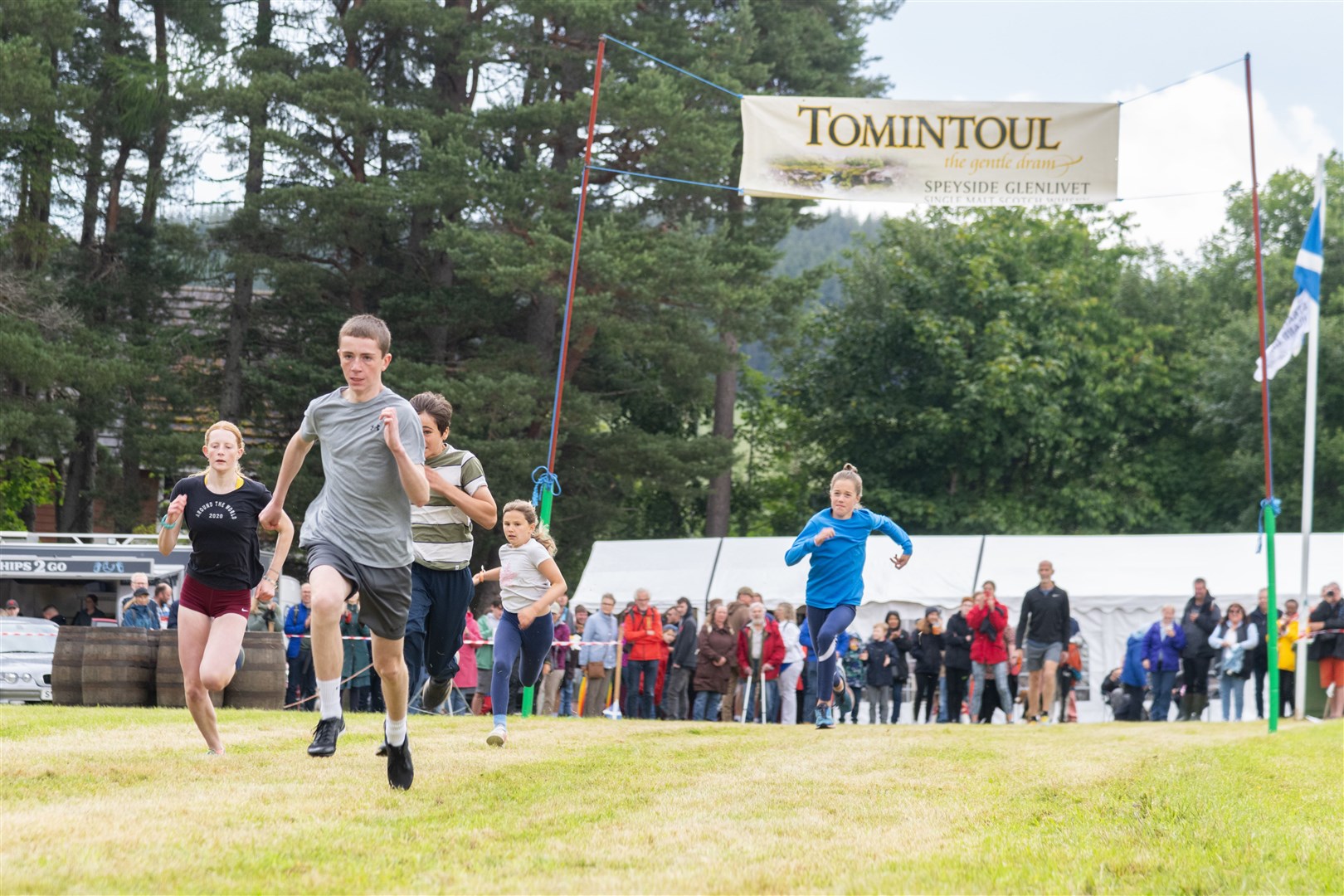 Cameron Fagan leading the Under 17's 90M Dash...180th Tomintoul Highland Games 2023...Picture: Beth Taylor.