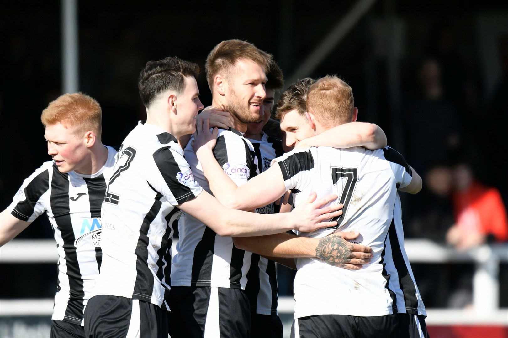 Brian Cameron celebrates his opening goal with team mates. Picture: Daniel Forsyth