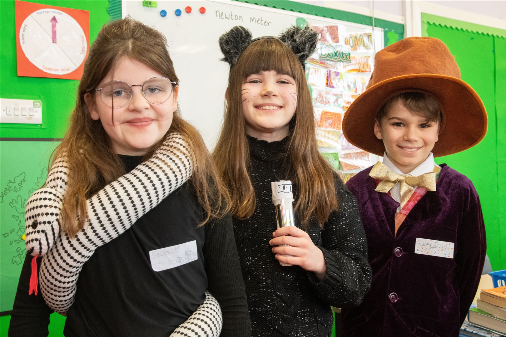From left; Nissi Hall (from The Witches by Roald Dahl), Kayla Mulholland (Tot the Ninja Cat) and Roger Long (Willy Wonka).. Picture: Daniel Forsyth..