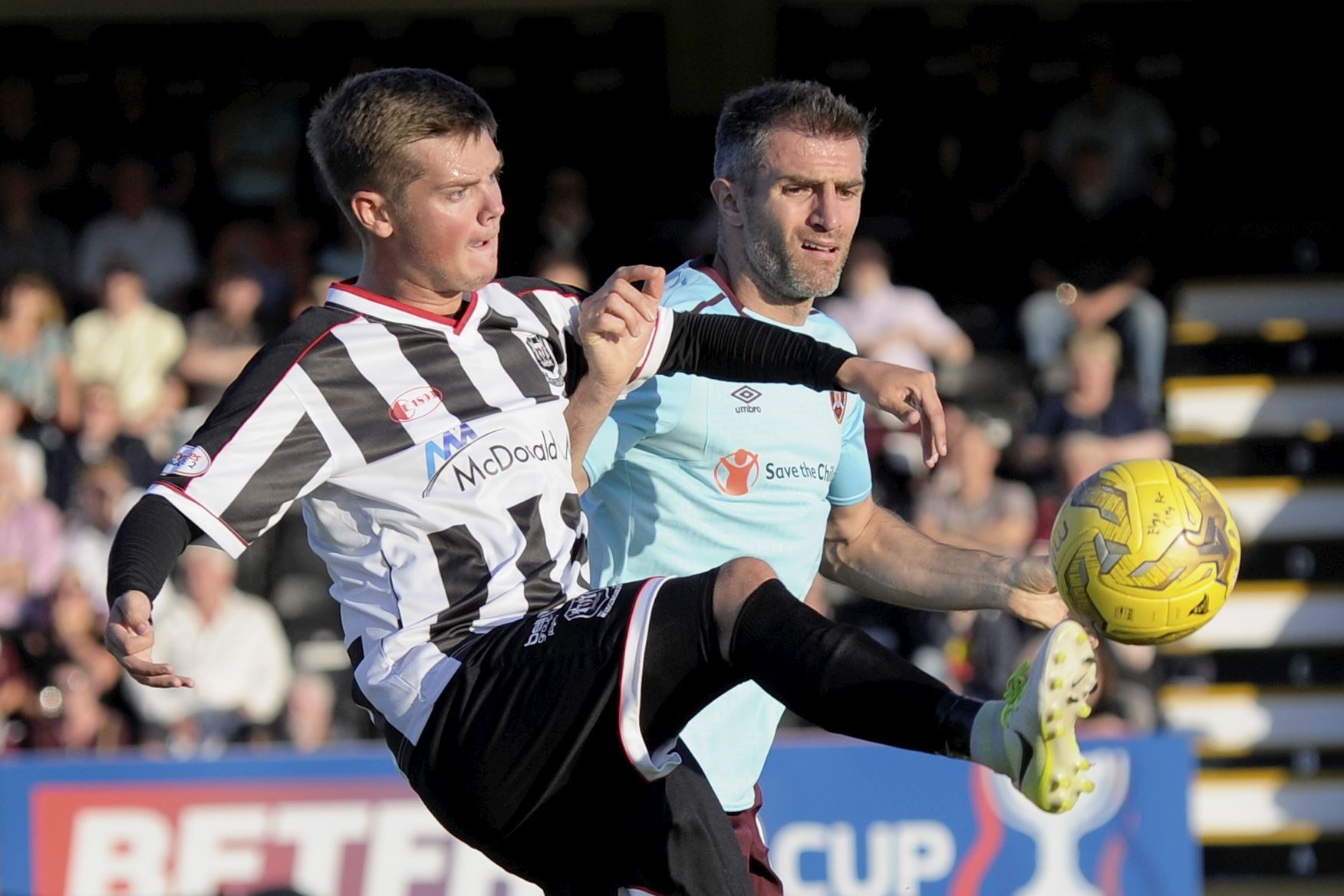 Thomas Reilly challenges Hearts’ Aaron Hughes during his spell at Elgin City in 2017. Next term he could play against Elgin in a Kelty Hearts shirt. Picture: Daniel Forsyth