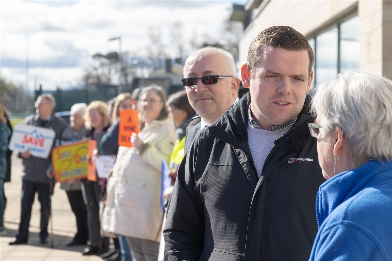 Moray MP Douglas Ross talking to the "Save Our Surgeries" campaign group who were protesting outside the Moray Coast Health Centre in Lossiemouth to save both Hopeman and Burghead GP surgeries. ..Picture: Beth Taylor.