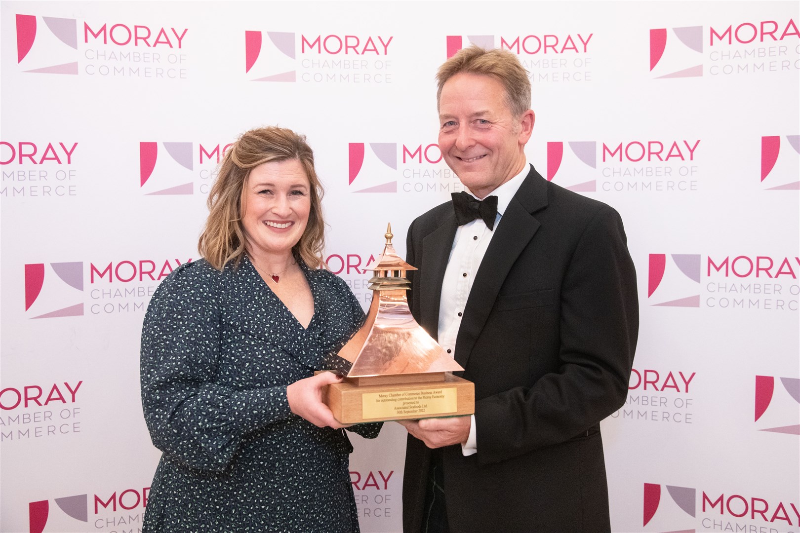 Kirsty Dagnan presents Henry Angus of Associated Seafood with the business award...17th Annual Moray Chamber of Commerce Awards Dinner, held at Gordon Castle on Friday 30th September 2022...Picture: Daniel Forsyth..