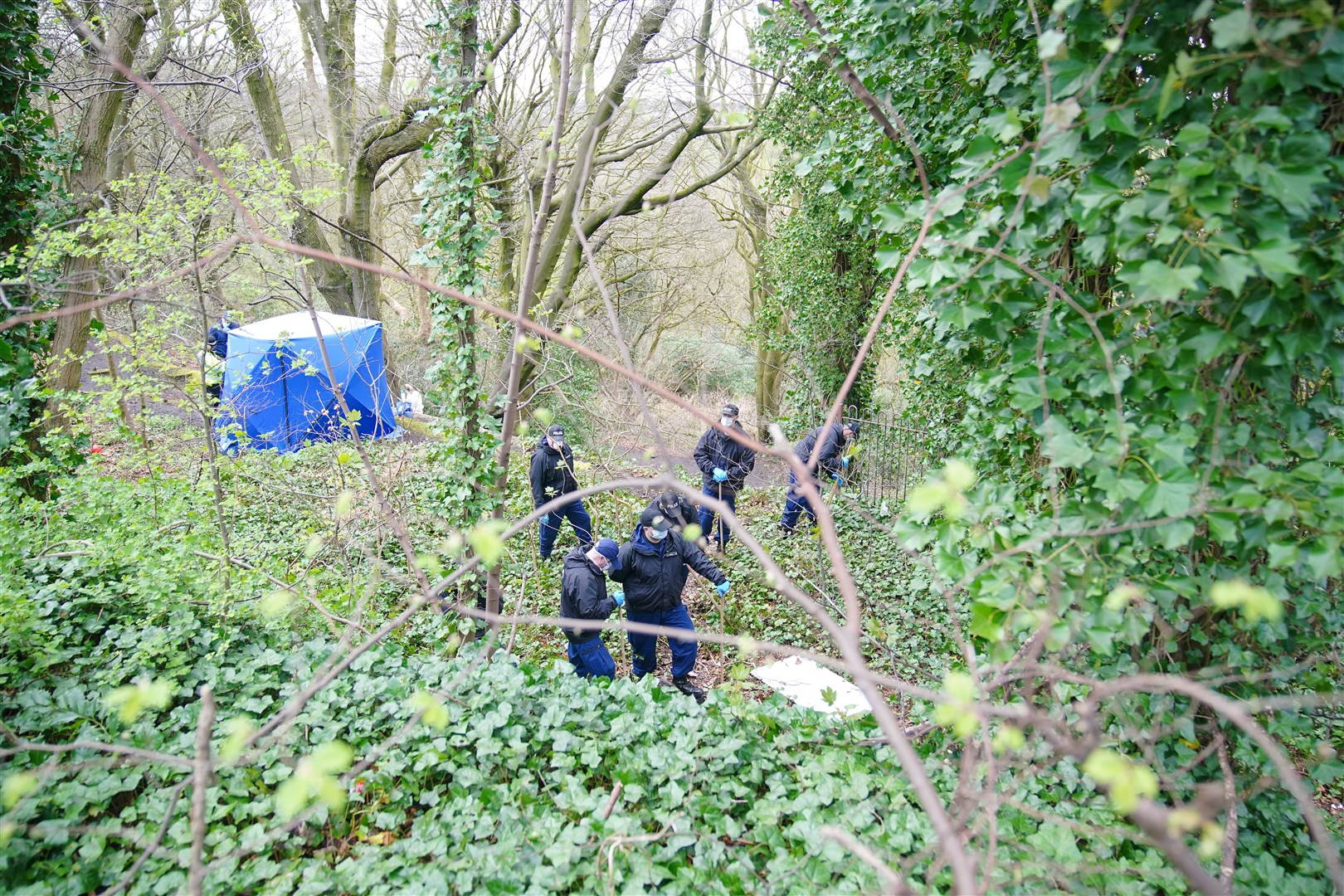 Police officers search Kersal Dale Wetlands, near Salford, after human remains were found (Peter Byrne/PA)
