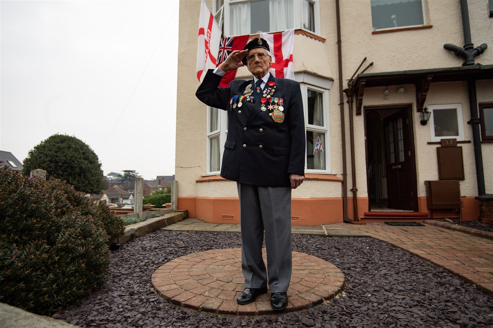 Merchant Navy veteran Bill Bennett, 94, wears his medals whilst at his home in Kidderminster, during the two-minute silence (Jacob King/PA)